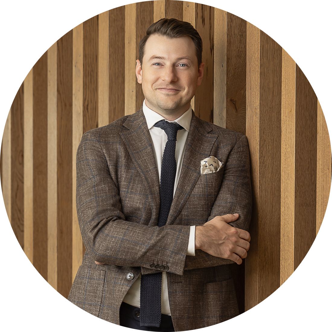 Dr. Kelling standing with arms crossed.